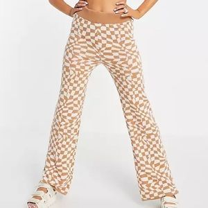 ASOS DESIGN co-ord knitted flare trouser in distorted check pattern in camel